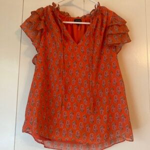 Orange flutter top